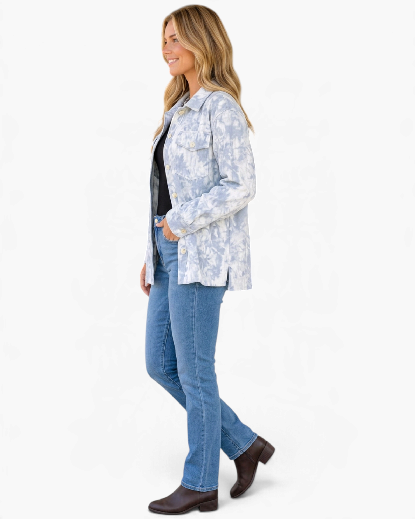 Beach Rose Co. light blue and white tie-dye corduroy shacket worn by a model with blue jeans and brown boots