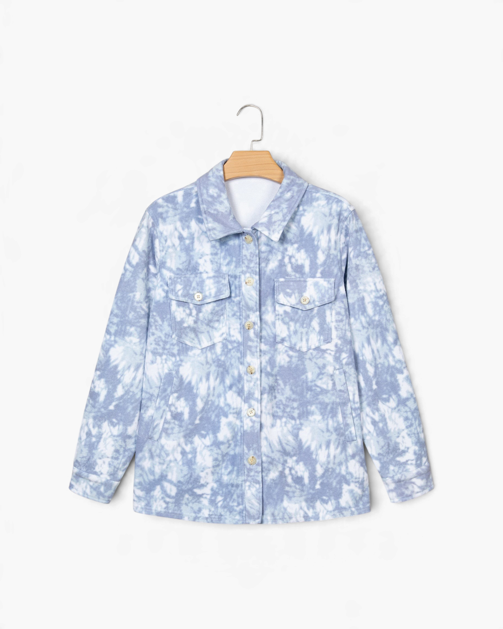 Beach Rose Co. light blue and white tie-dye corduroy shacket with button-front closure and chest pockets.