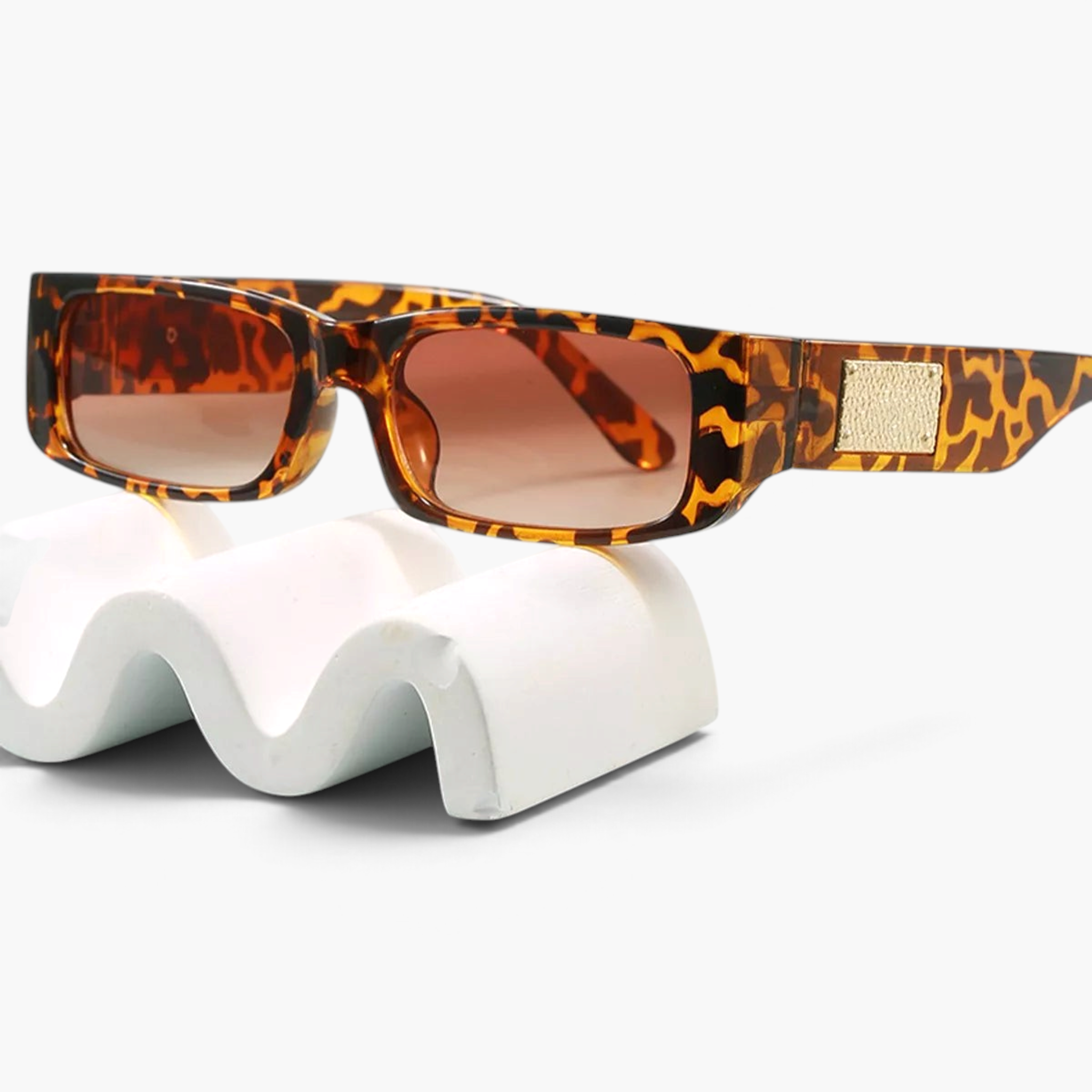 Beach Rose Co. retro rectangular sunglasses in tortoise shell print with textured gold temple accents.