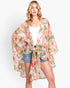 Beach Rose Co. lightweight tropical flower and leaf print shawl cover-up worn by a blonde model over a white tank top.
