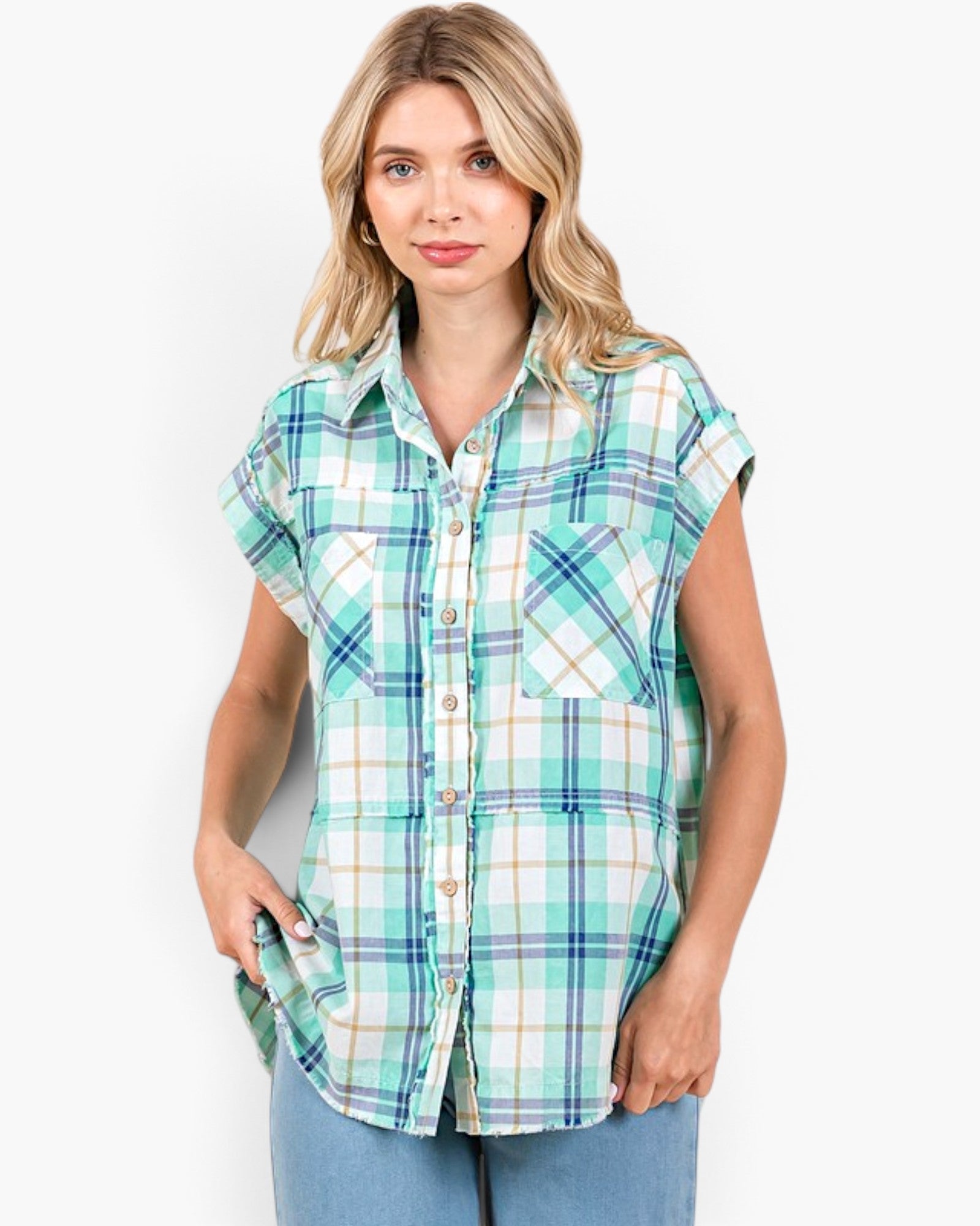 Beach Rose Co. turquoise plaid cotton button-front shirt with cap sleeves and raw hem on a blonde model