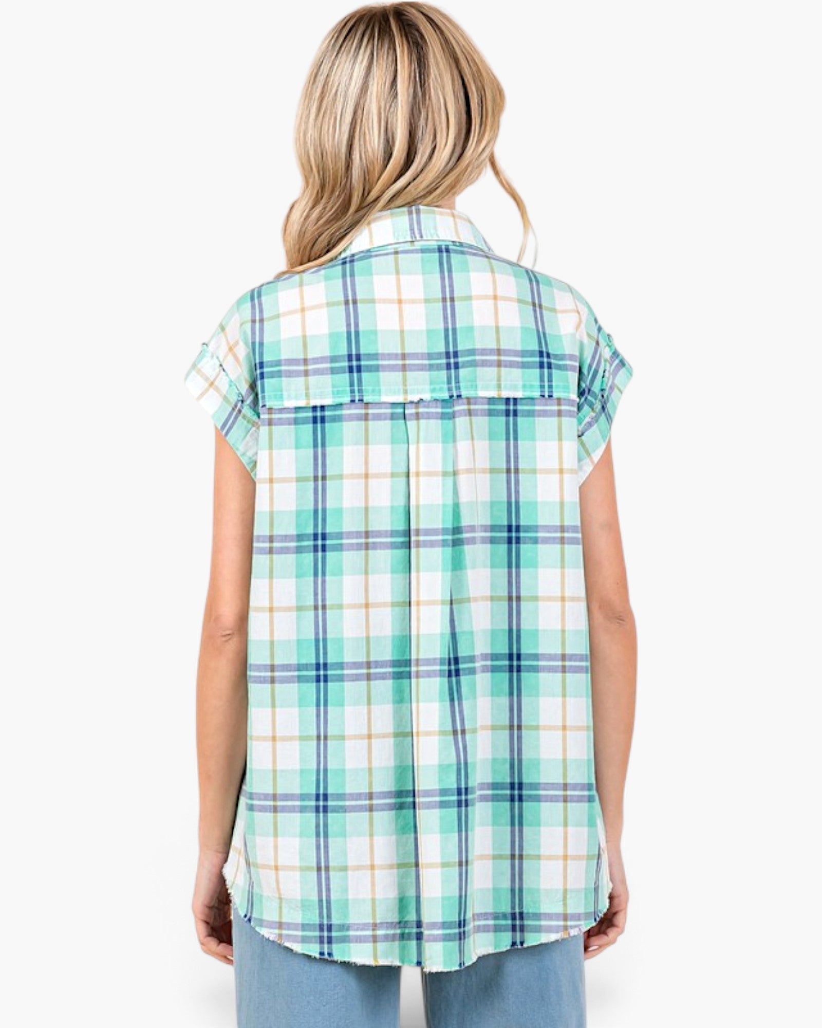 Back view of a Beach Rose Co. turquoise plaid cotton shirt with cap sleeves, pleated back, and raw-edge hem.
