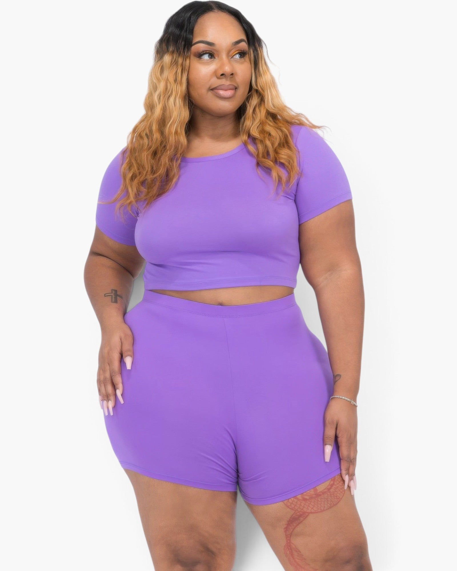 Beach Rose Co. plus size violet short sleeve crop top and matching shorts set on a model