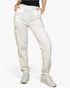Beach Rose Co. white drawstring sweatpants with side cargo pockets and elastic cuffs worn by a woman