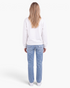 Back view of a Beach Rose Co. white crewneck sweatshirt in a cotton-polyester blend worn with blue jeans.