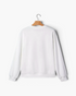 Beach Rose Co. white crewneck sweatshirt with long sleeves and ribbed trim, shown from the back on a wooden hanger.