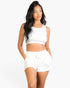 Beach Rose Co. white two-piece set featuring a cropped scoop-neck tank top and drawstring shorts on a model.