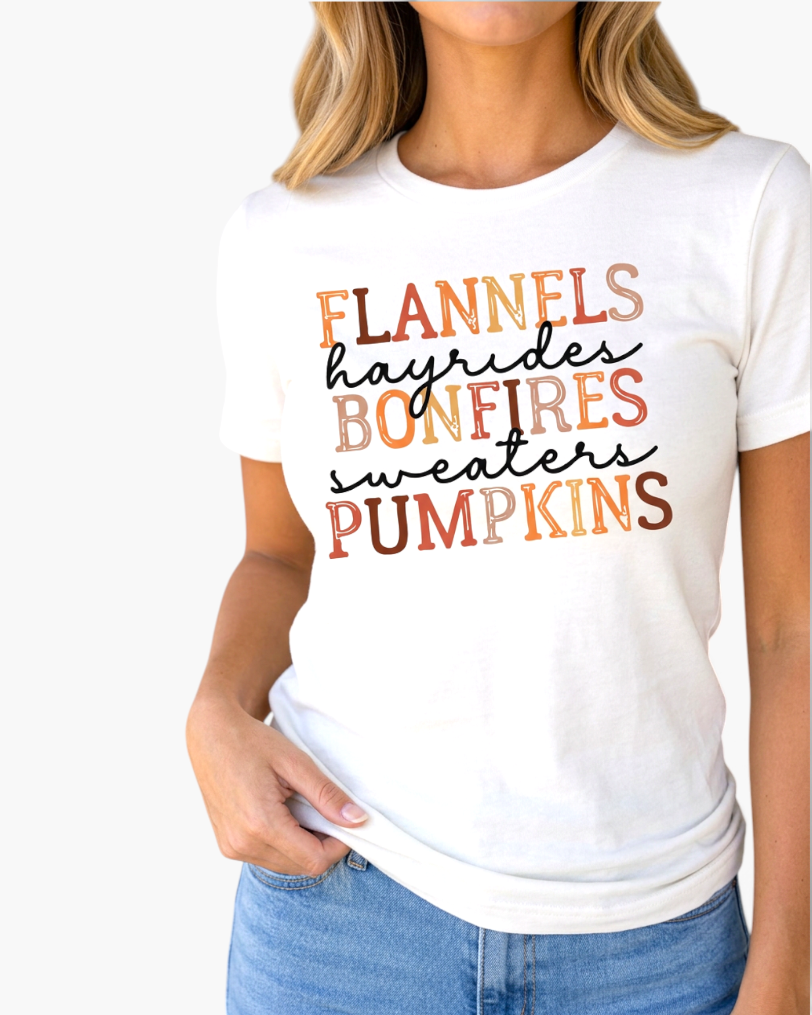 Beach Rose Co. white crew neck graphic t-shirt with autumn-themed typography in warm seasonal colors.