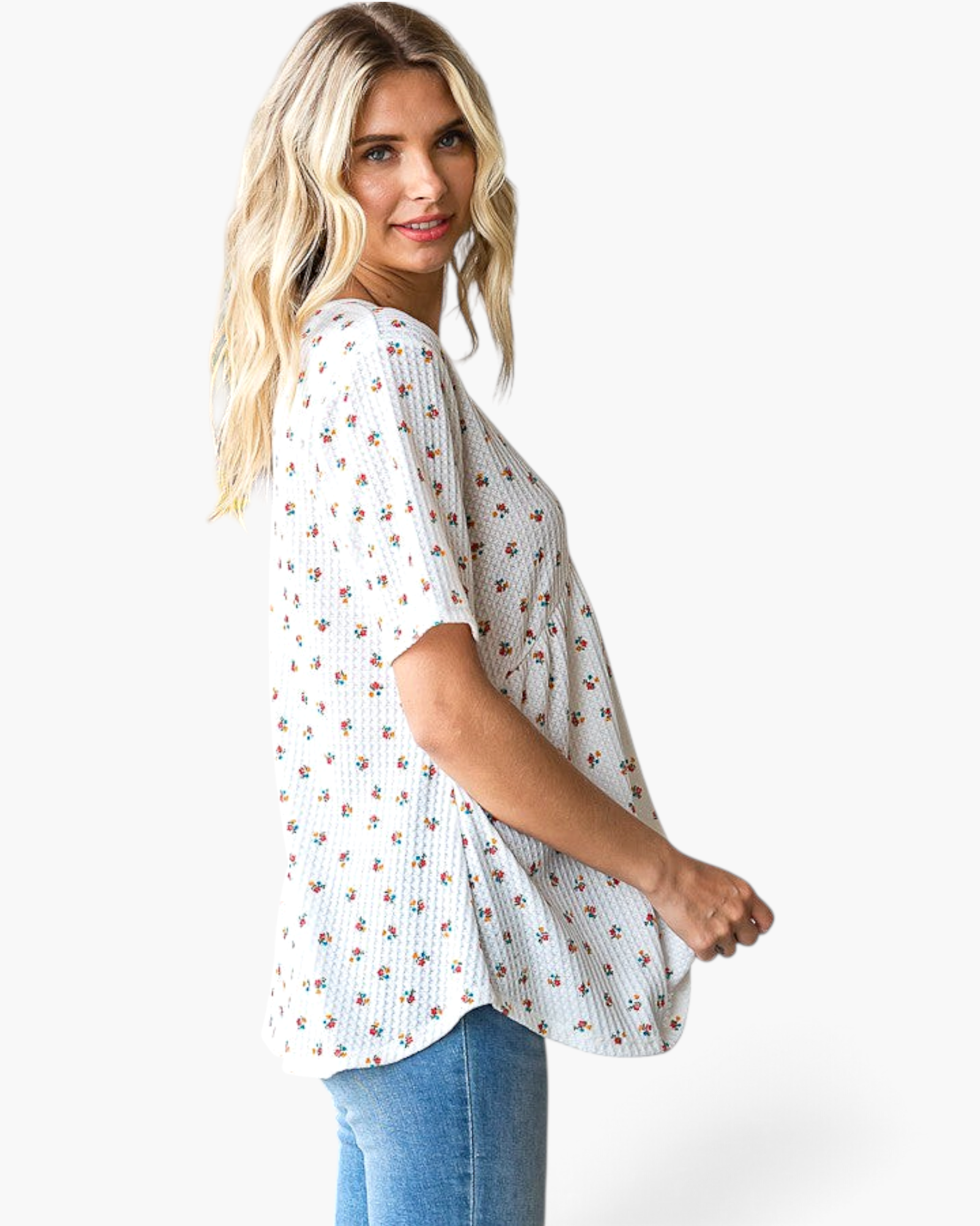 Beach Rose Co. white textured waffle knit tunic with a colorful ditsy floral print and short sleeves