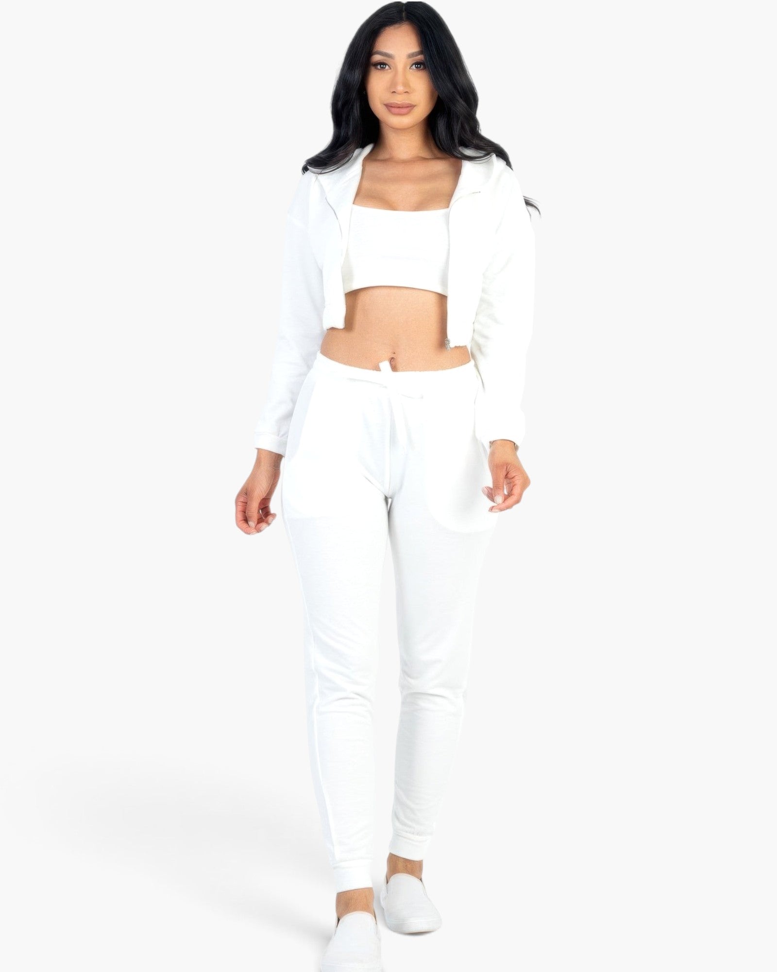 Beach Rose Co. white French terry three-piece set featuring a cropped cami, zip-up jacket, and tapered joggers.