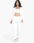 Beach Rose Co. white French terry three-piece set featuring a cropped cami, zip-up jacket, and tapered joggers.
