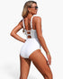 Beach Rose Co. white one-piece swimsuit with mesh panels, lace-up back, and ring-accented straps on a woman.
