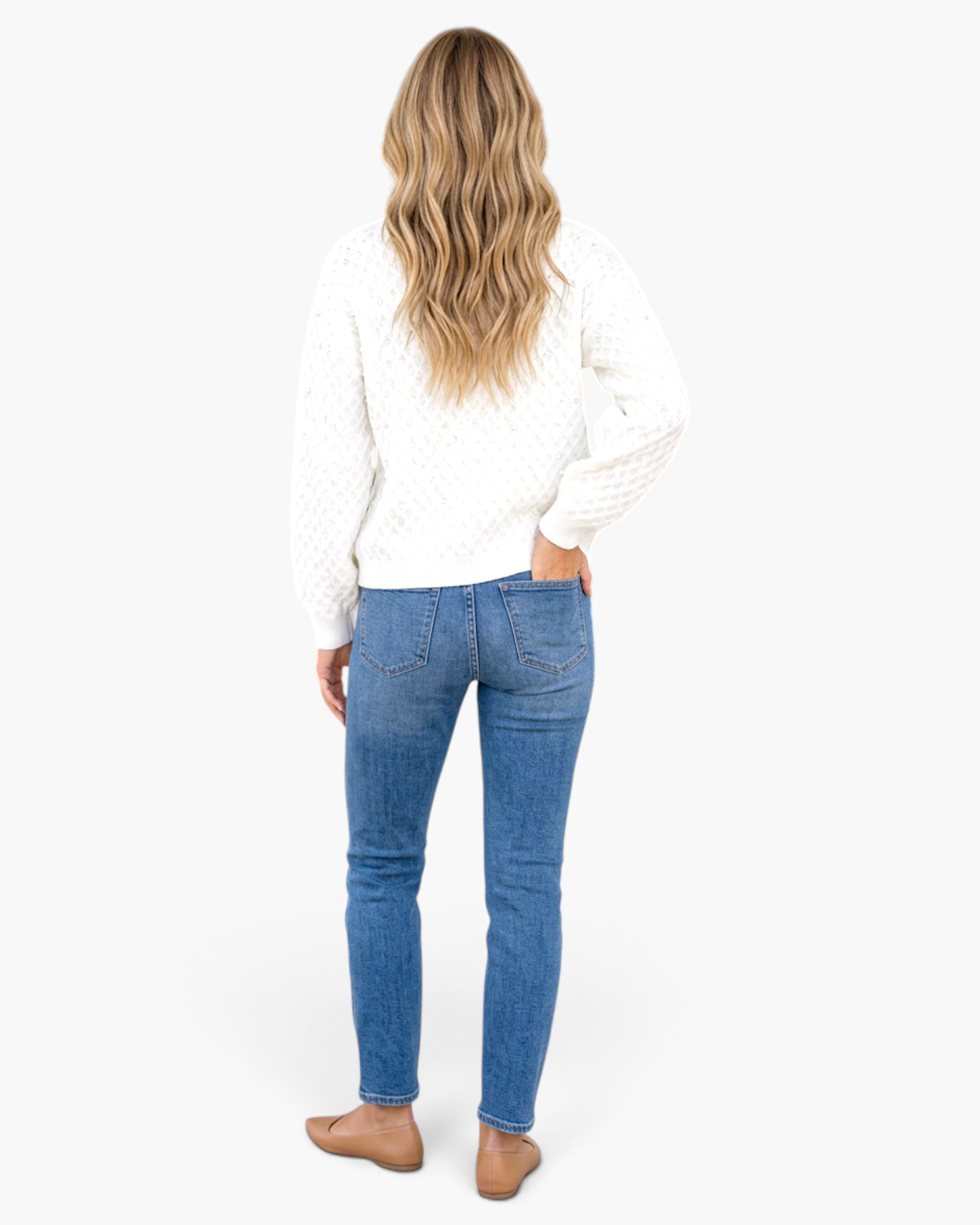 Beach Rose Co. white diamond-knit sweater with faux pearls worn with blue jeans and tan flats, back view