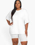 Beach Rose Co. plus size model wearing a white loose fit t-shirt and matching biker shorts in soft jersey fabric