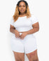Beach Rose Co. plus size model wearing a white short sleeve crop top and matching shorts in soft stretch jersey fabric