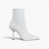 Beach Rose Co. white pleather ankle boots with a pointed toe and 3.5-inch sculpted spool heel.
