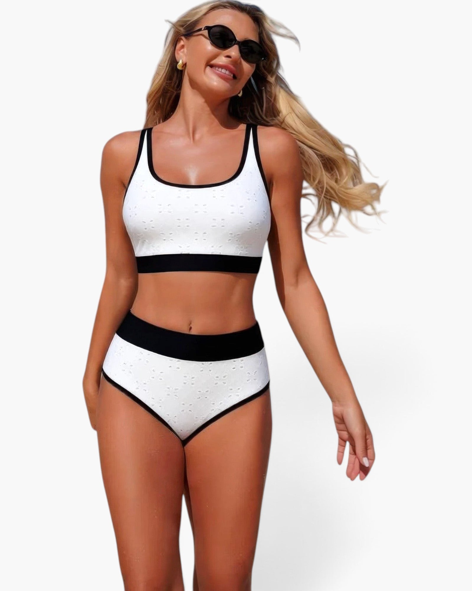 Beach Rose Co. white high-waisted bikini set with black contrast trim and textured polka-dot pattern on a model