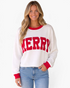 Beach Rose Co. white waffle knit crewneck sweatshirt with red MERRY lettering and contrast red trim on a model