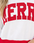 Beach Rose Co. white waffle knit crewneck sweatshirt with bold red MERRY lettering and contrast red hem detail.