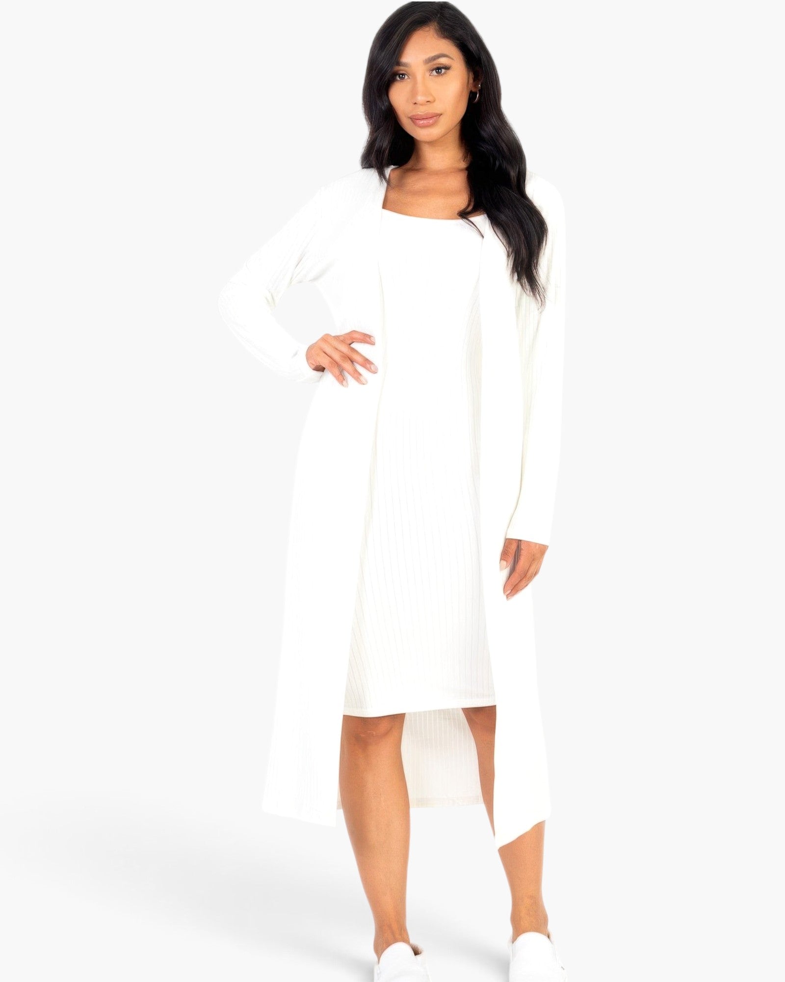 Beach Rose Co. white ribbed midi bodycon dress and matching long cardigan set worn by a model on a white background.