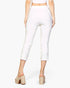Beach Rose Co. white cropped pants with a slit hem and elastic waist, worn by a model in beige platform mules.