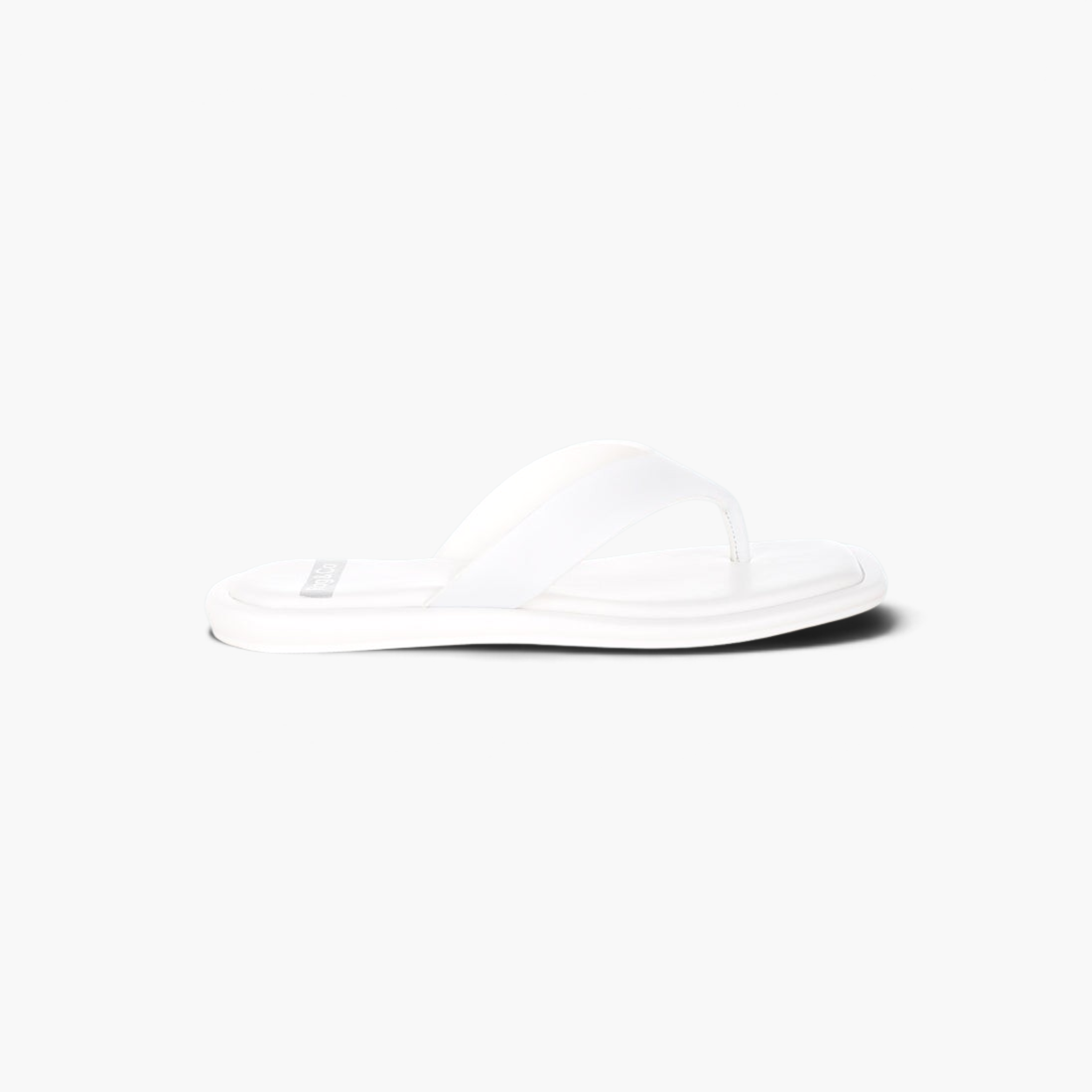 Beach Rose Co. white square-toe thong sandals with a flat cushioned footbed and slip-on design
