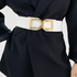 Beach Rose Co. white stretch waist belt with a polished gold-tone double-D buckle worn over a black blazer