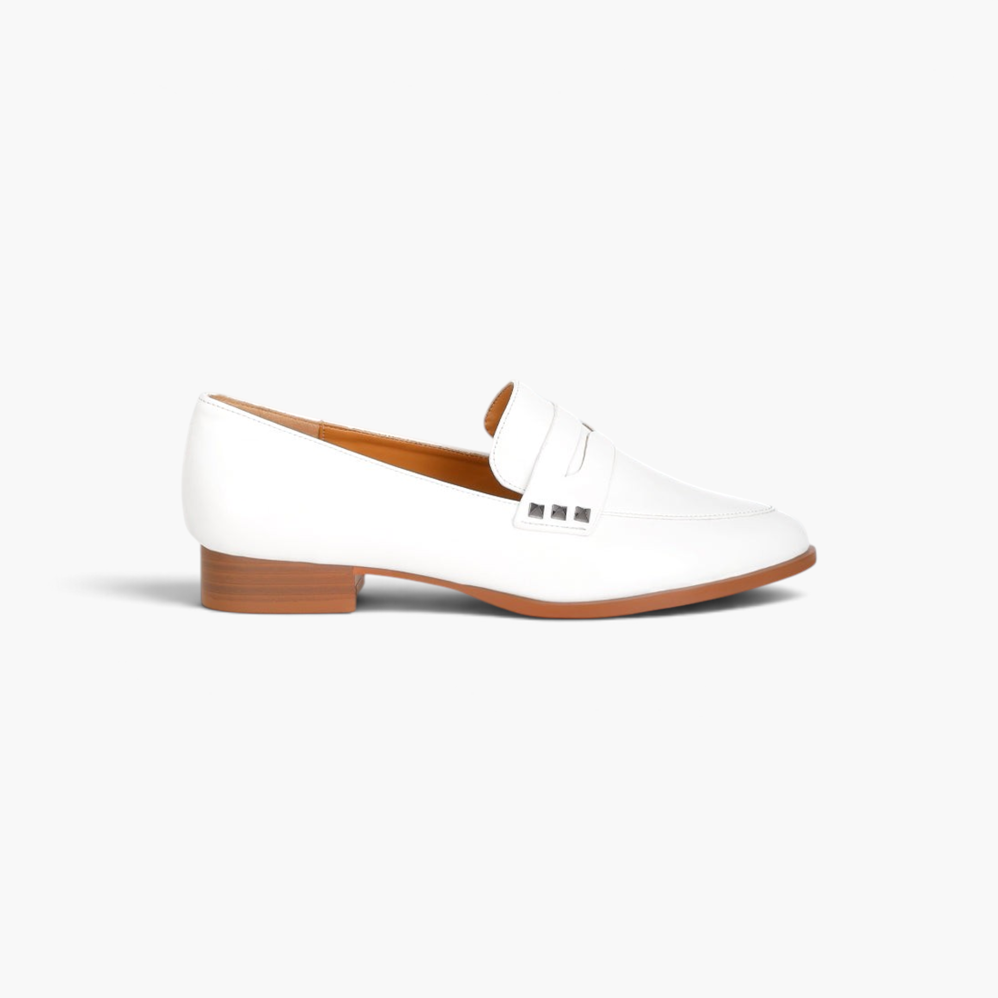 Beach Rose Co. white patent pleather penny loafers with stud accents on the strap and a low block heel