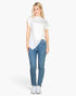 Beach Rose Co. white batwing sleeve twist front tee worn by a blonde model with blue jeans and white sneakers