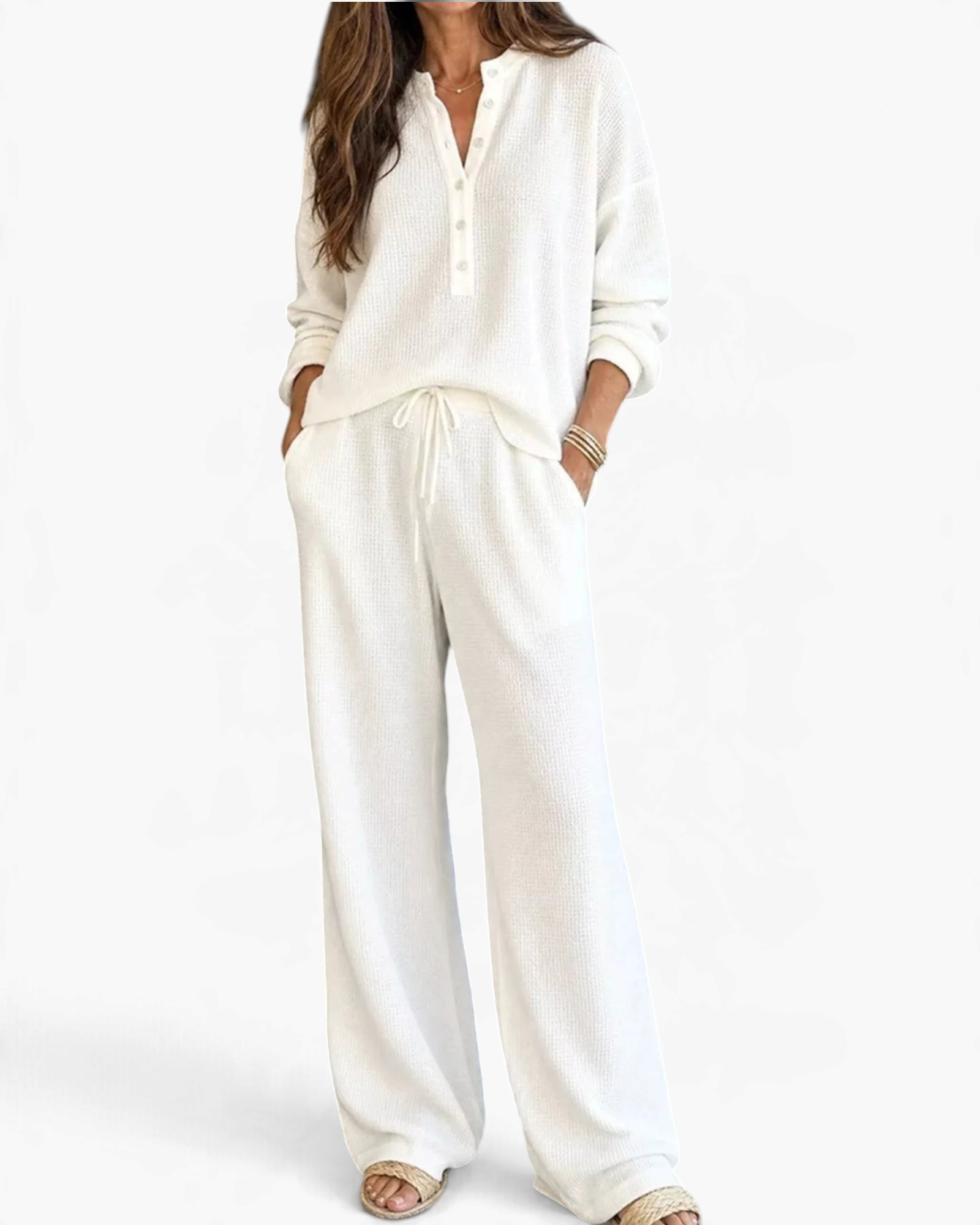 Beach Rose Co. white waffle knit two-piece set with button-up top and drawstring pants on a model