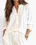 Beach Rose Co. white waffle knit two-piece set featuring a button-down top and drawstring pants with pockets.