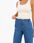 Beach Rose Co. medium wash wide leg jeans with an elastic drawstring waistband and vertical front seam details.