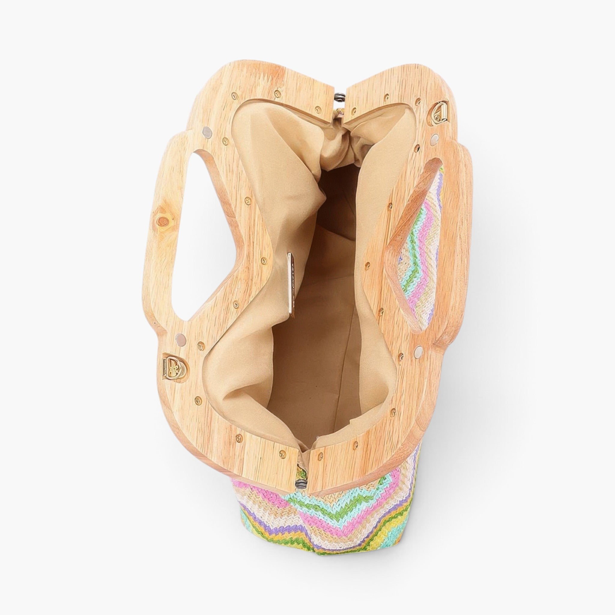 Beach Rose Co. clutch with a light wood frame and colorful chevron faux straw fabric interior view