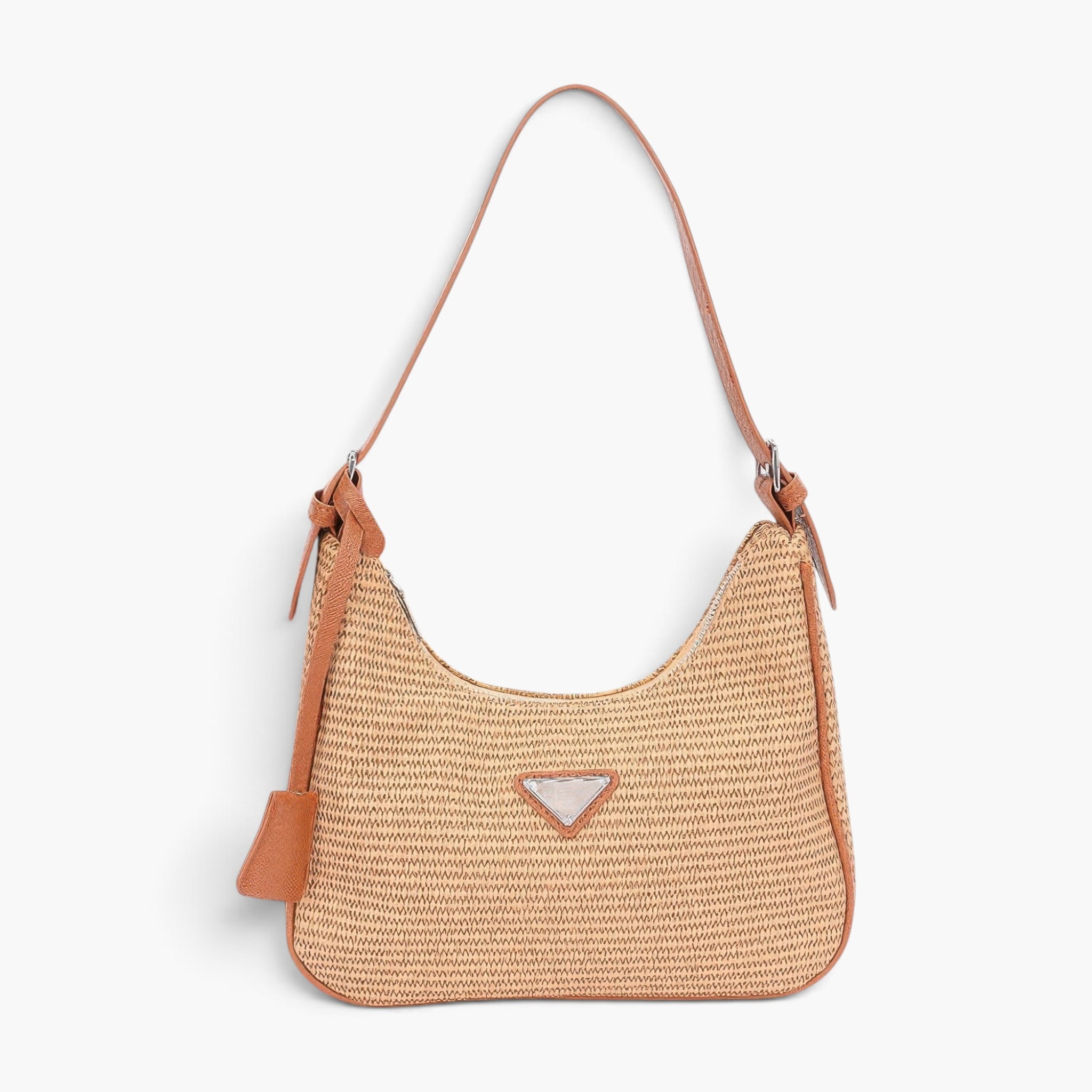Beach Rose Co. woven straw shoulder bag with tan faux leather trim and a distinctive triangle detail on the front