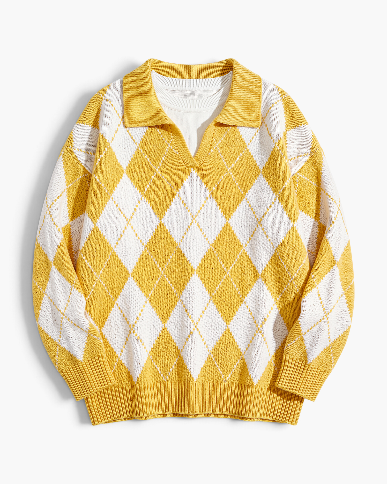 Beach Rose Co. yellow and white argyle sweater with a fold-over collar, V-neckline, and relaxed fit.
