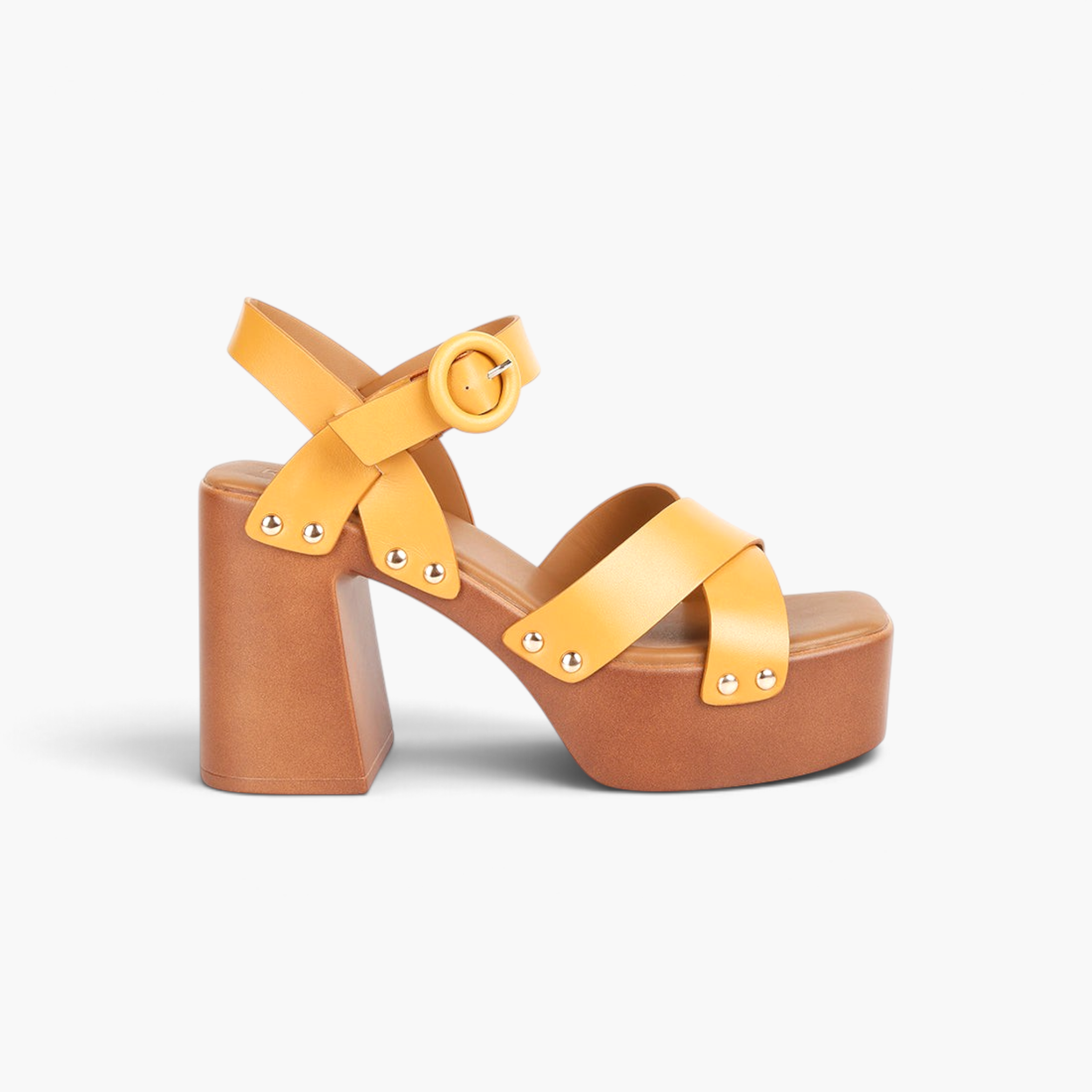 Beach Rose Co. yellow leather platform sandals with cross-straps, metal stud accents, and a block heel.