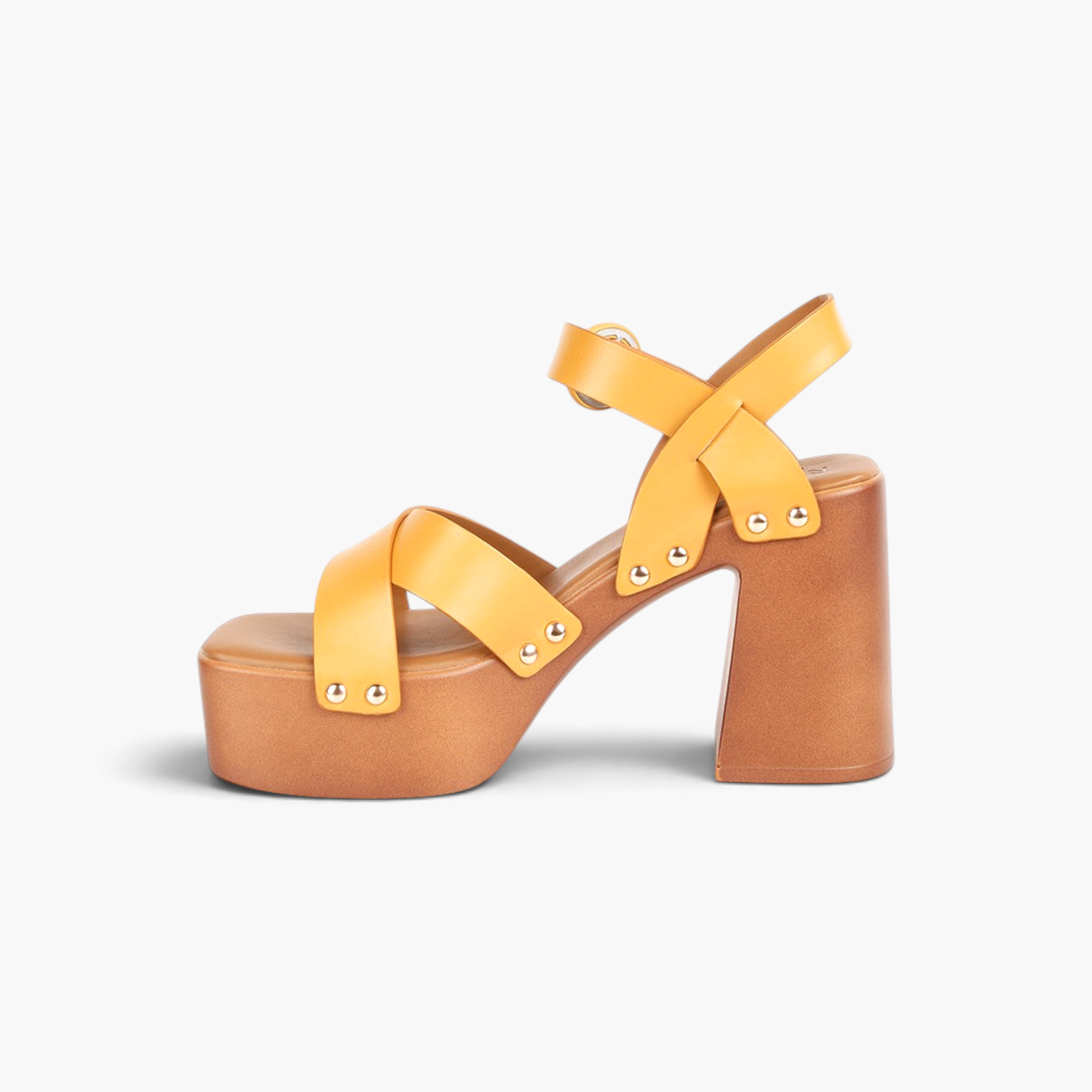 Beach Rose Co. yellow leather platform sandals with cross-straps, silver stud accents, and an adjustable buckle.