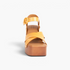 Beach Rose Co. yellow leather platform sandals with cross-strap design, stud accents, and adjustable buckle closure.