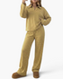 Beach Rose Co. yellow striped two-piece set with a collared V-neck pullover and matching wide-leg pants.