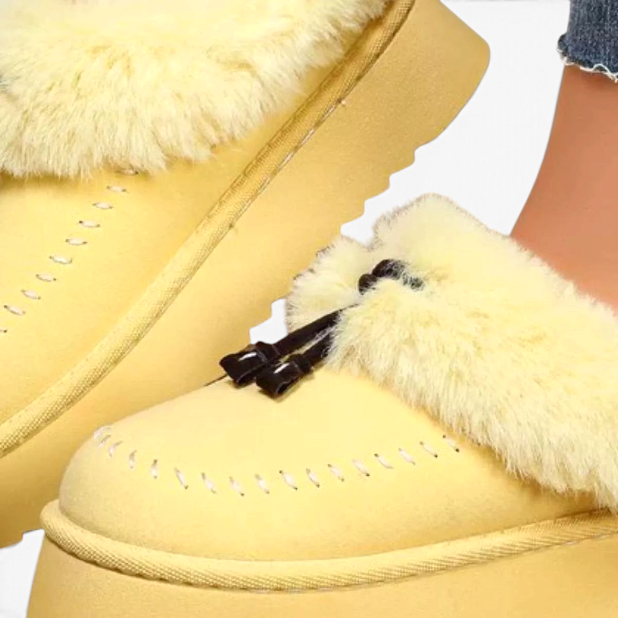 Beach Rose Co. yellow suede platform clogs with plush faux fur trim, moccasin stitching, and decorative tassels.