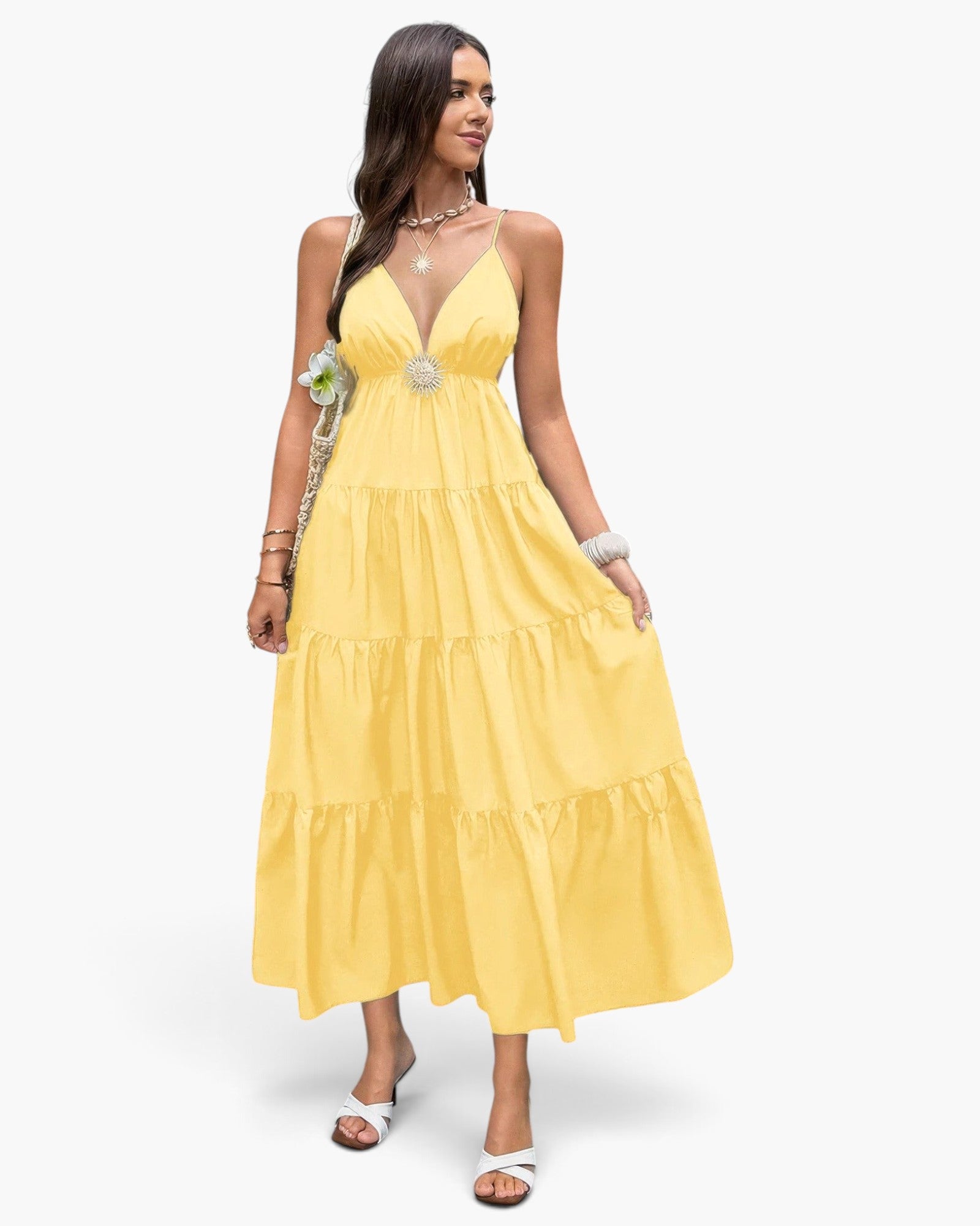 Beach Rose Co. yellow sleeveless tiered maxi dress with an open back and high waist, worn by a model.