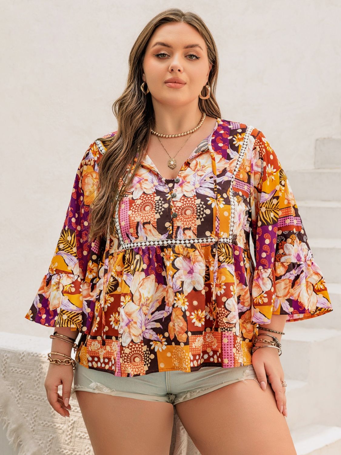 Beach Rose Co.Plus Size Floral Print Tie Neck Babydoll Blouse in Tangerine