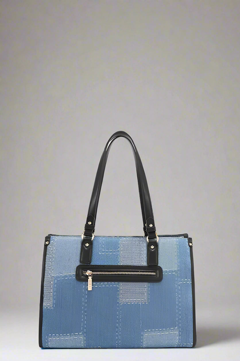 Blue textured handbag with black handle and zipper on a white background