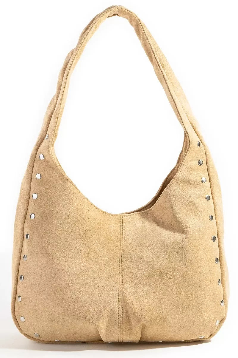Beige handbag with studded details on a white background