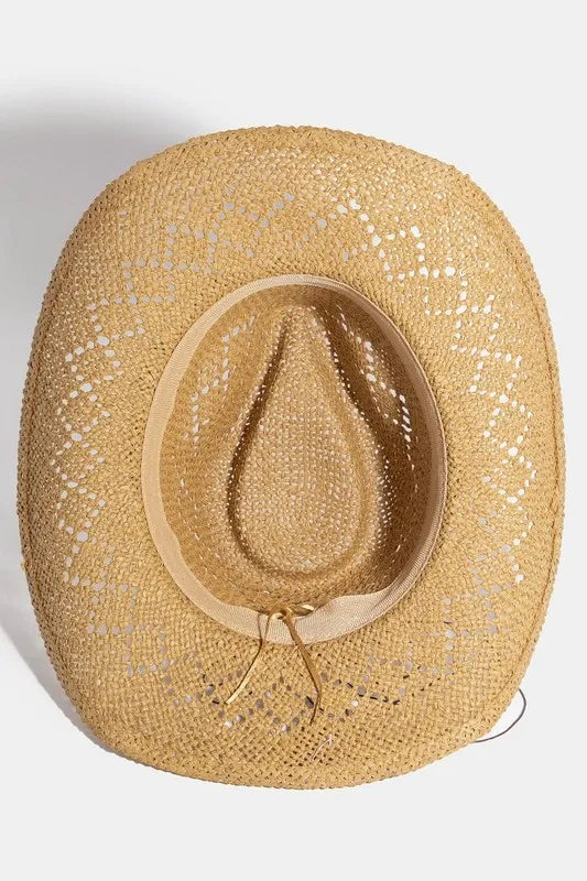 Beige straw hat with decorative band on a white background