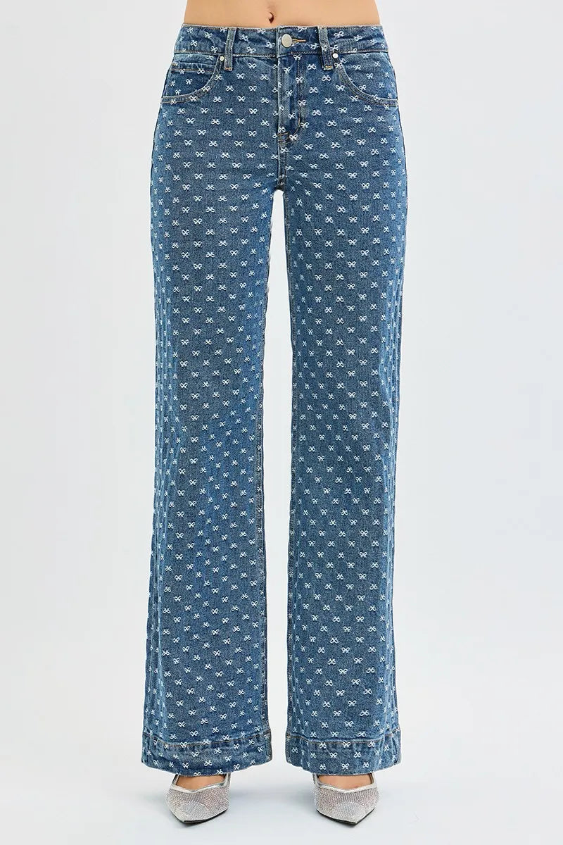 Blue patterned jeans on a white background