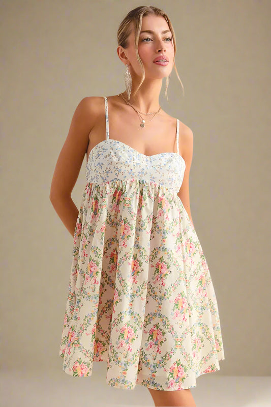 Woman wearing a floral dress against a beige background