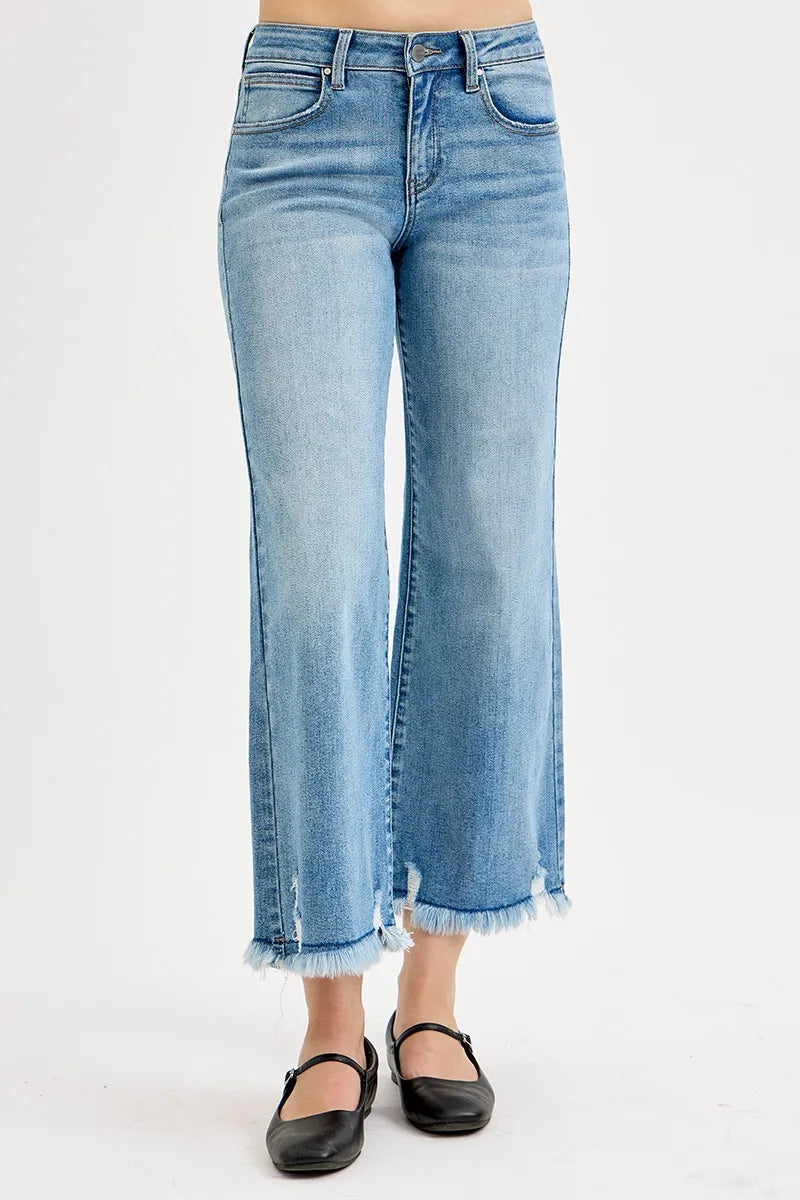 Light blue jeans with a white background