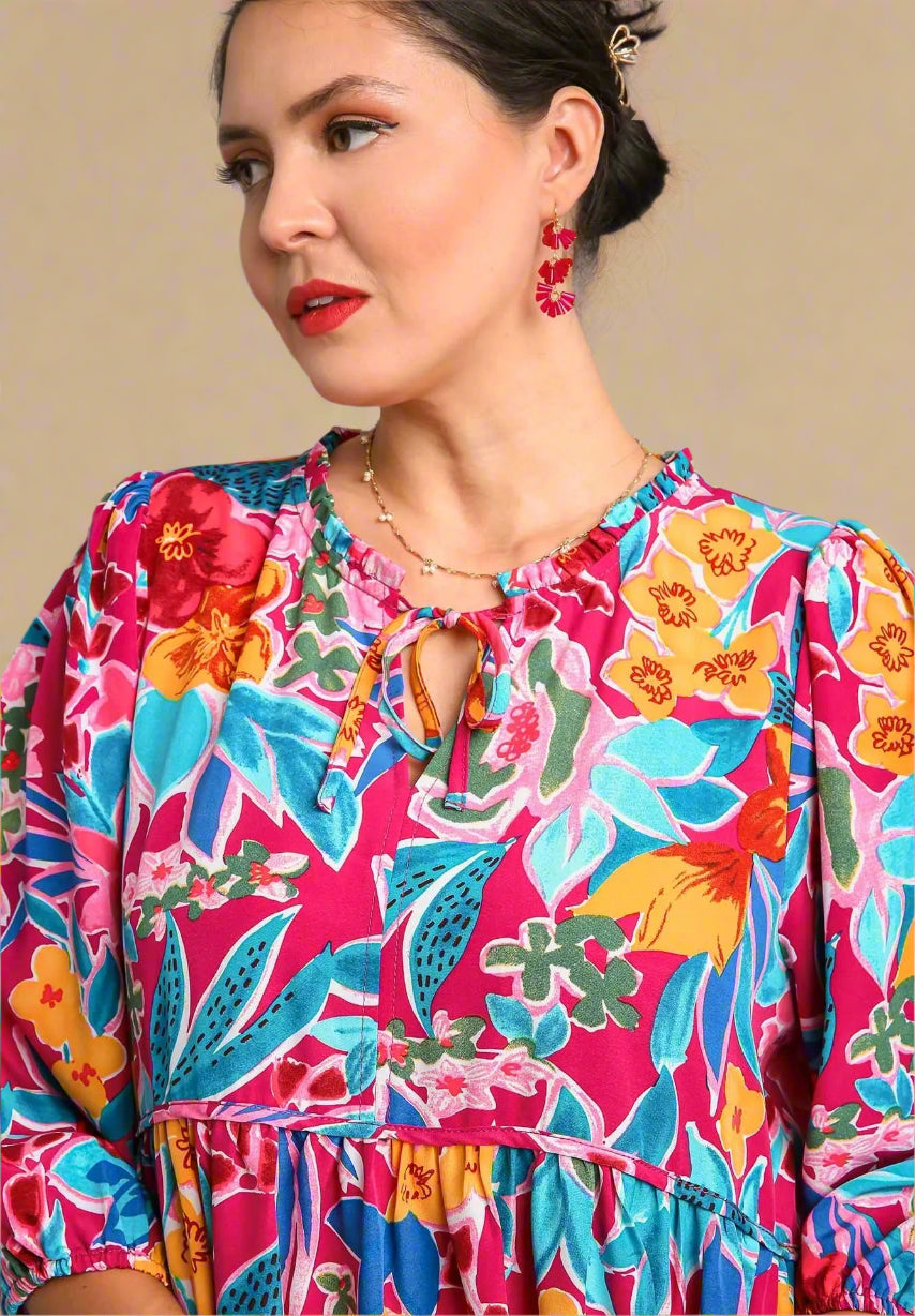 Woman wearing a colorful floral dress
