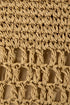 Close-up of a textured beige fabric with a woven pattern